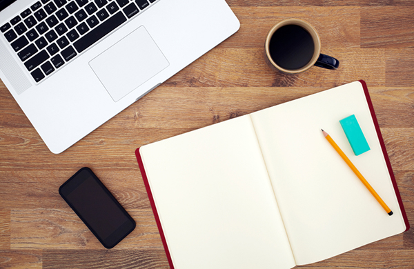 Coffee and paper notes go well together. Watch out to not spill your black nectar on computers or papers
